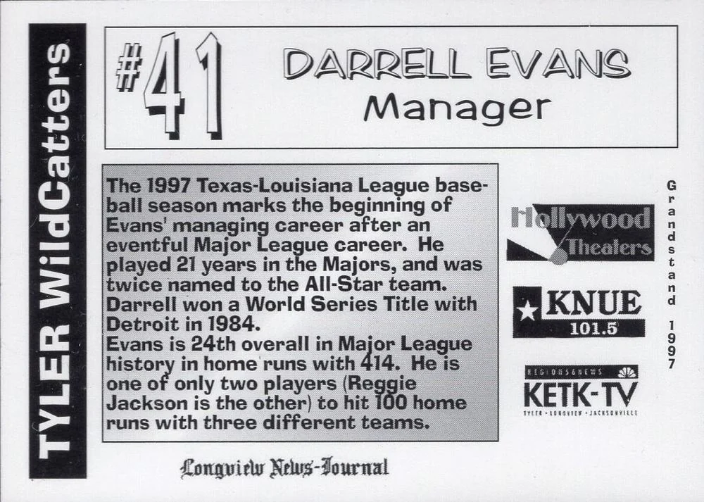 Back of the 1997 Grandstand card for Darrell Evans, number 41, manager, summarizing his 21-year Major League career and 414 home runs, with sponsor logos for Hollywood Theaters, KNUE 101.5, KETK-TV and the Longview News-Journal