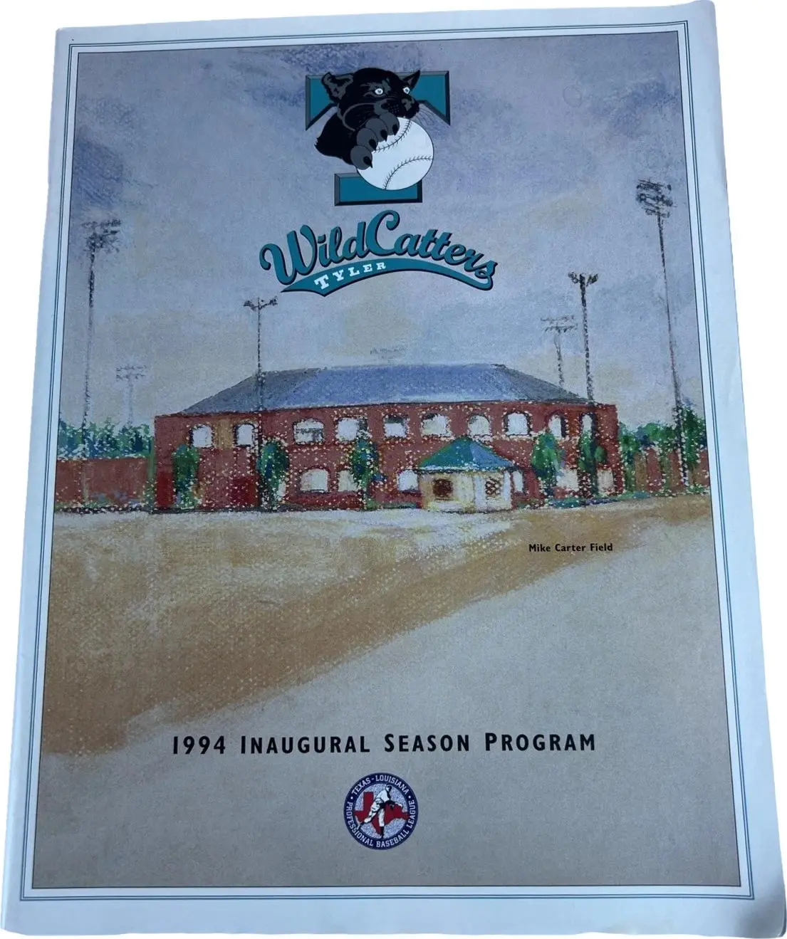 Tyler WildCatters 1994 inaugural season program cover featuring Mike Carter Field